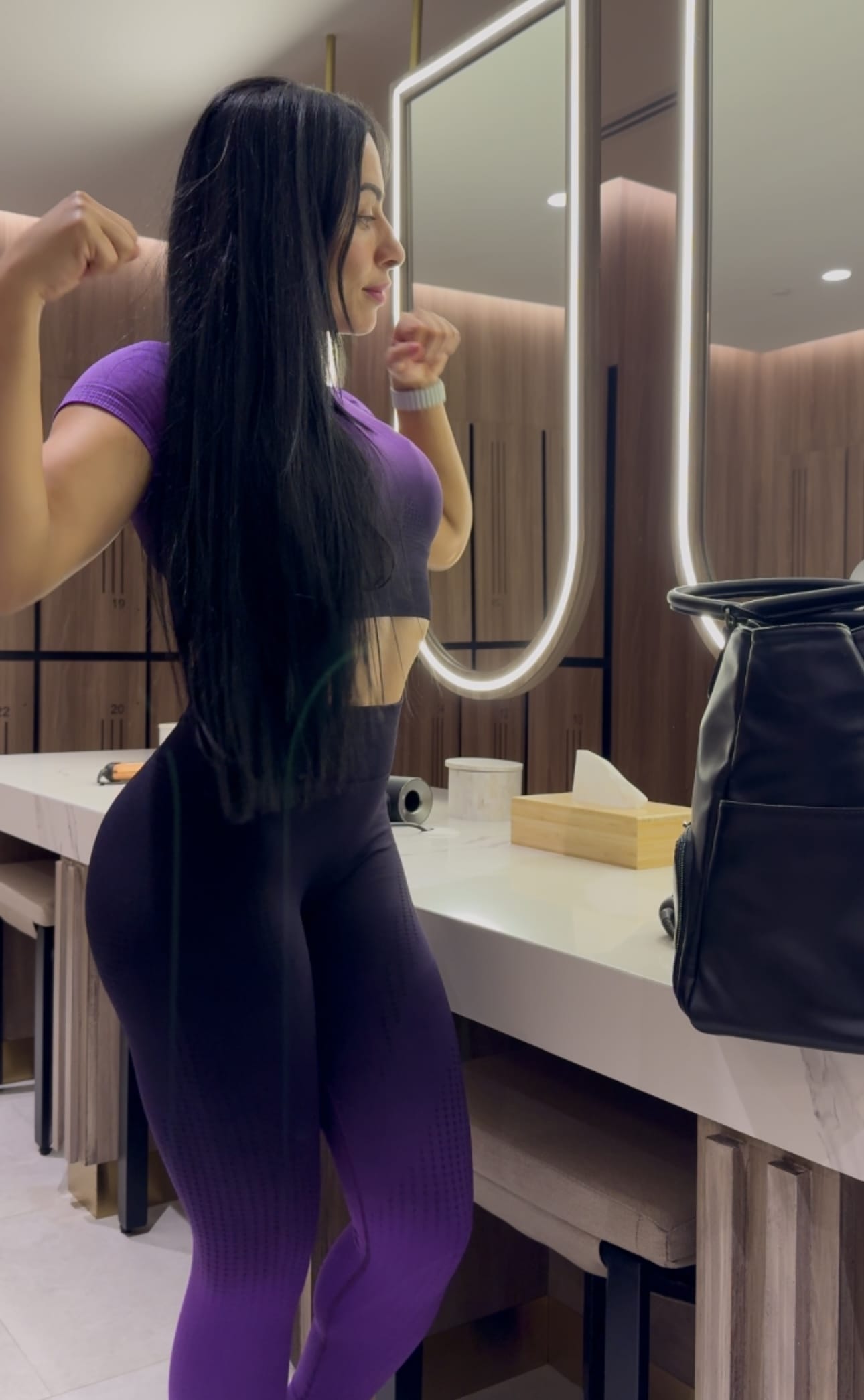 Marwa Ben Said flexing in a purple crop top